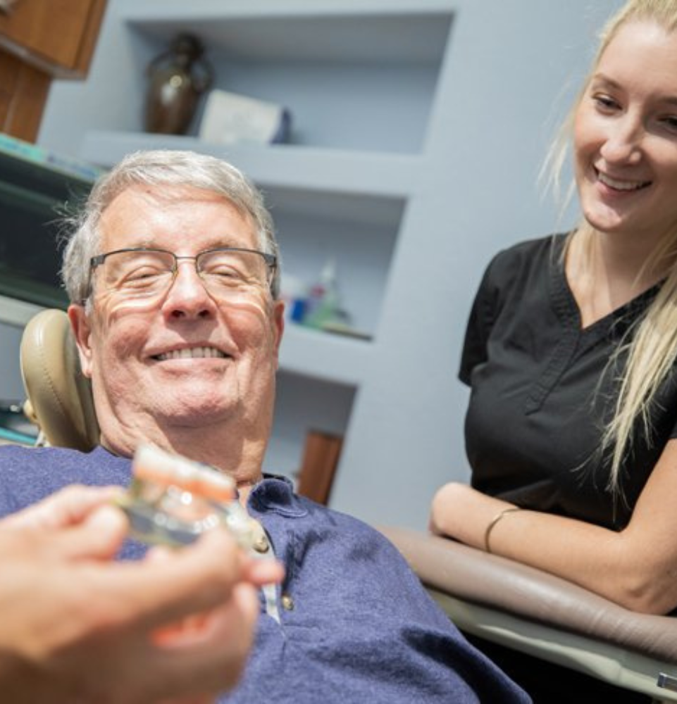 patient smiling in chair